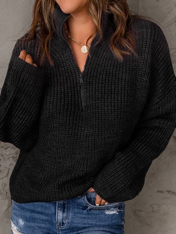 Women's zippered loose turtleneck long sleeve pullover sweater.