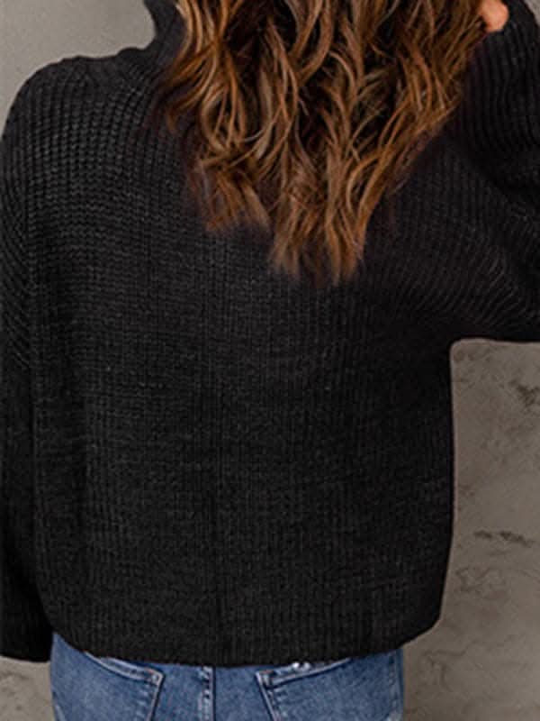 Women's zippered loose turtleneck long sleeve pullover sweater.