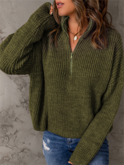 Women's zippered loose turtleneck long sleeve pullover sweater.