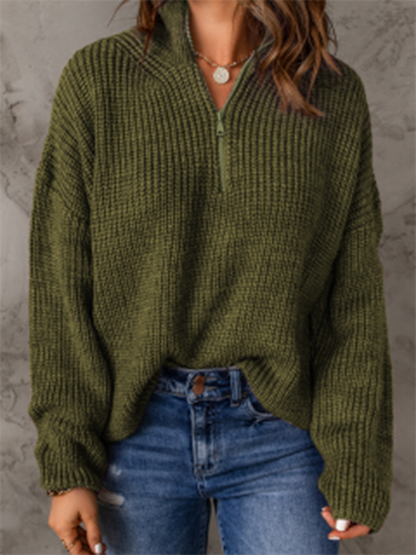 Women's zippered loose turtleneck long sleeve pullover sweater.