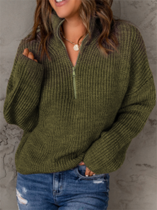 Women's zippered loose turtleneck long sleeve pullover sweater.