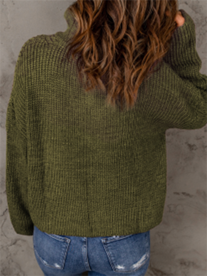 Women's zippered loose turtleneck long sleeve pullover sweater.