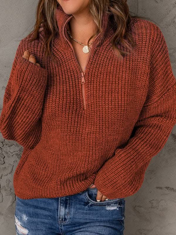 Women's zippered loose turtleneck long sleeve pullover sweater.