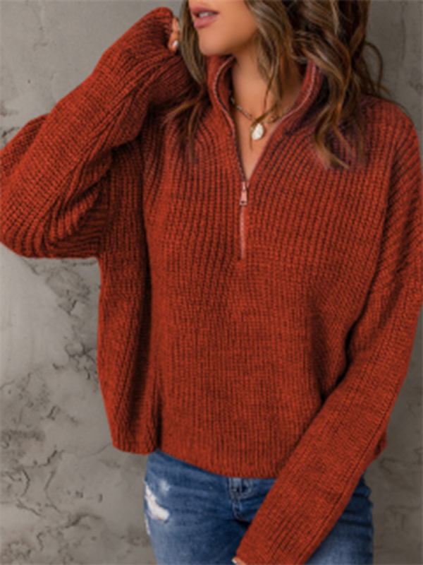 Women's zippered loose turtleneck long sleeve pullover sweater.