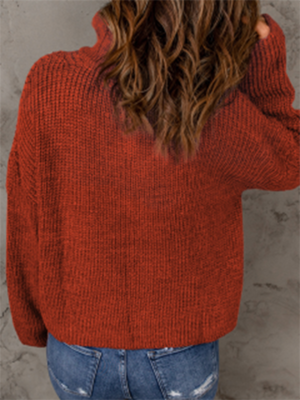 Women's zippered loose turtleneck long sleeve pullover sweater.