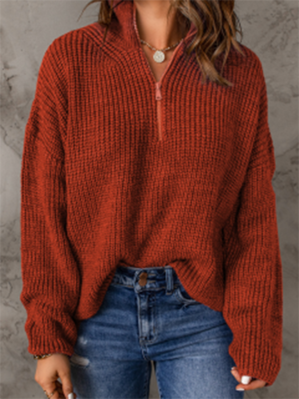Women's zippered loose turtleneck long sleeve pullover sweater.