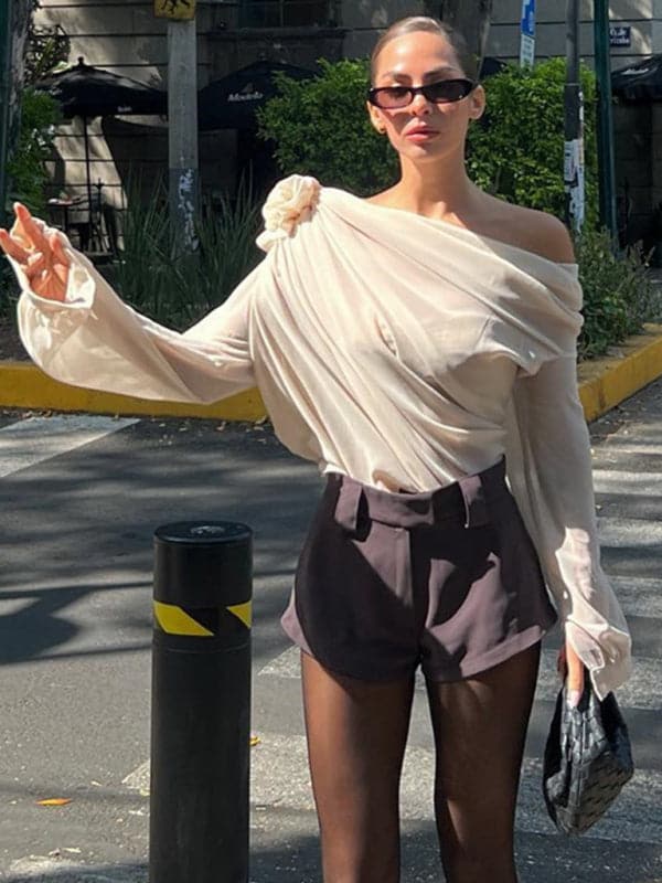 Women's off-shoulder chiffon floral loose top blouse.