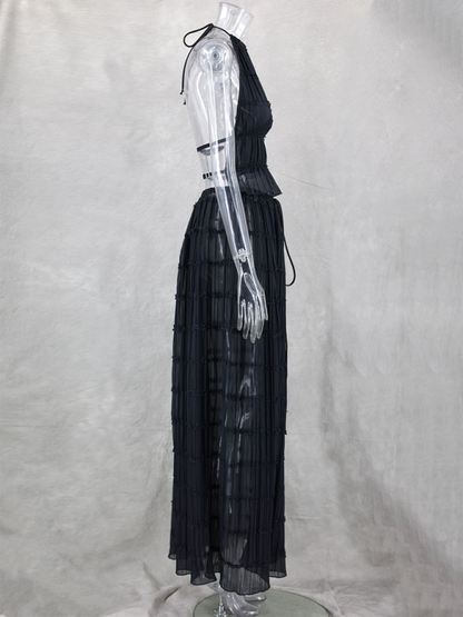 Backless lace-up halter top set and two-piece chiffon pleated long skirt with earrings.