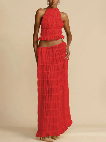 Backless lace-up halter top set and two-piece chiffon pleated long skirt with earrings.