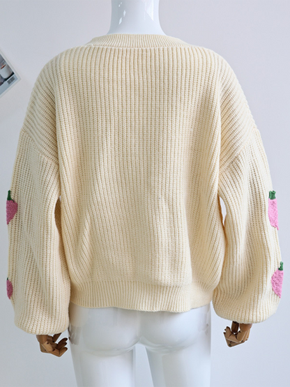 V-neck beige cardigan with strawberry embellishments