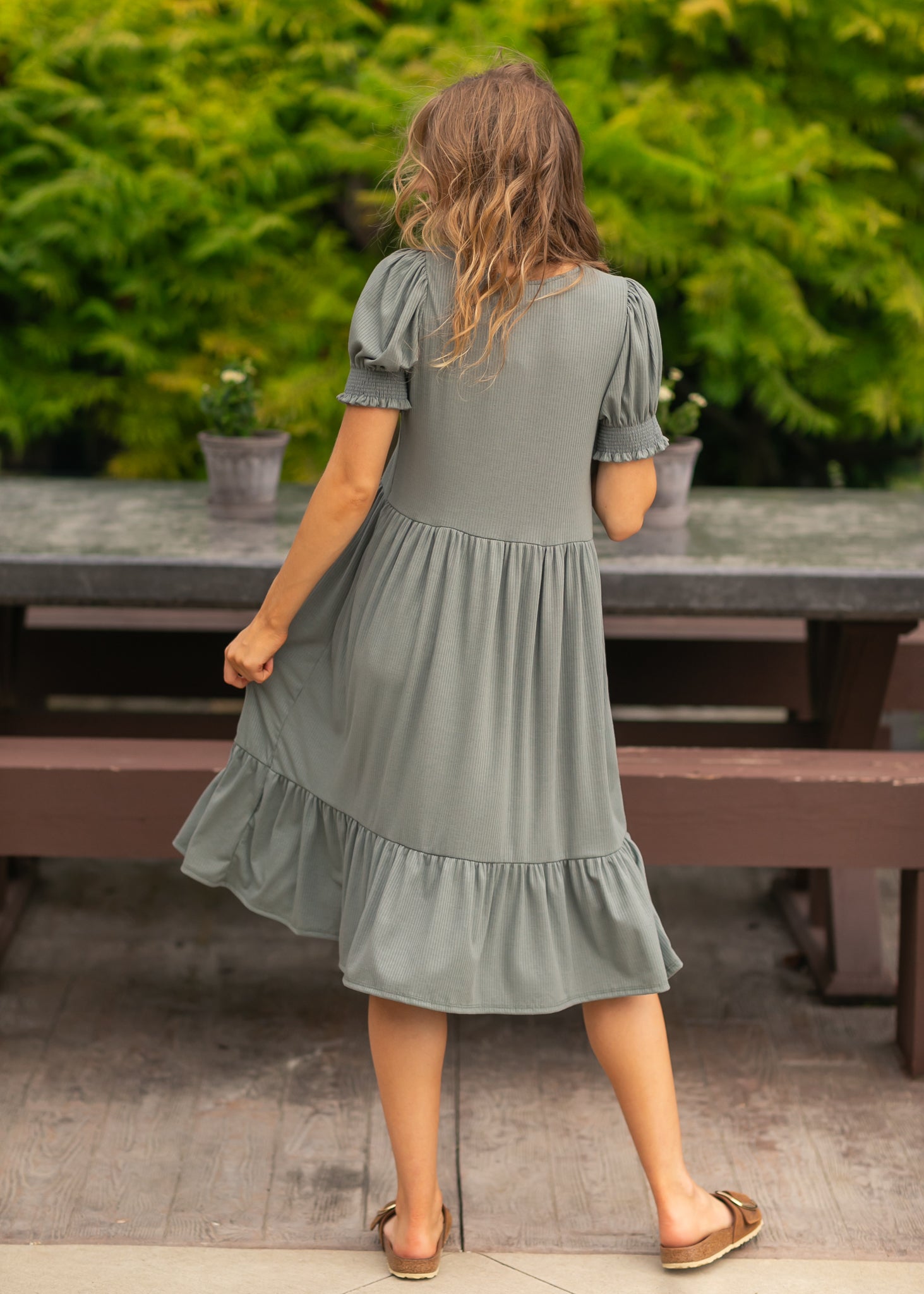 Detail of the Inherit Co. Jess Midi Dress hemline, showcasing its modest length and elegant drape for women's everyday style.