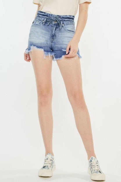 Kancan high rise frayed hem denim shorts showcasing fashionable and comfortable summer style.