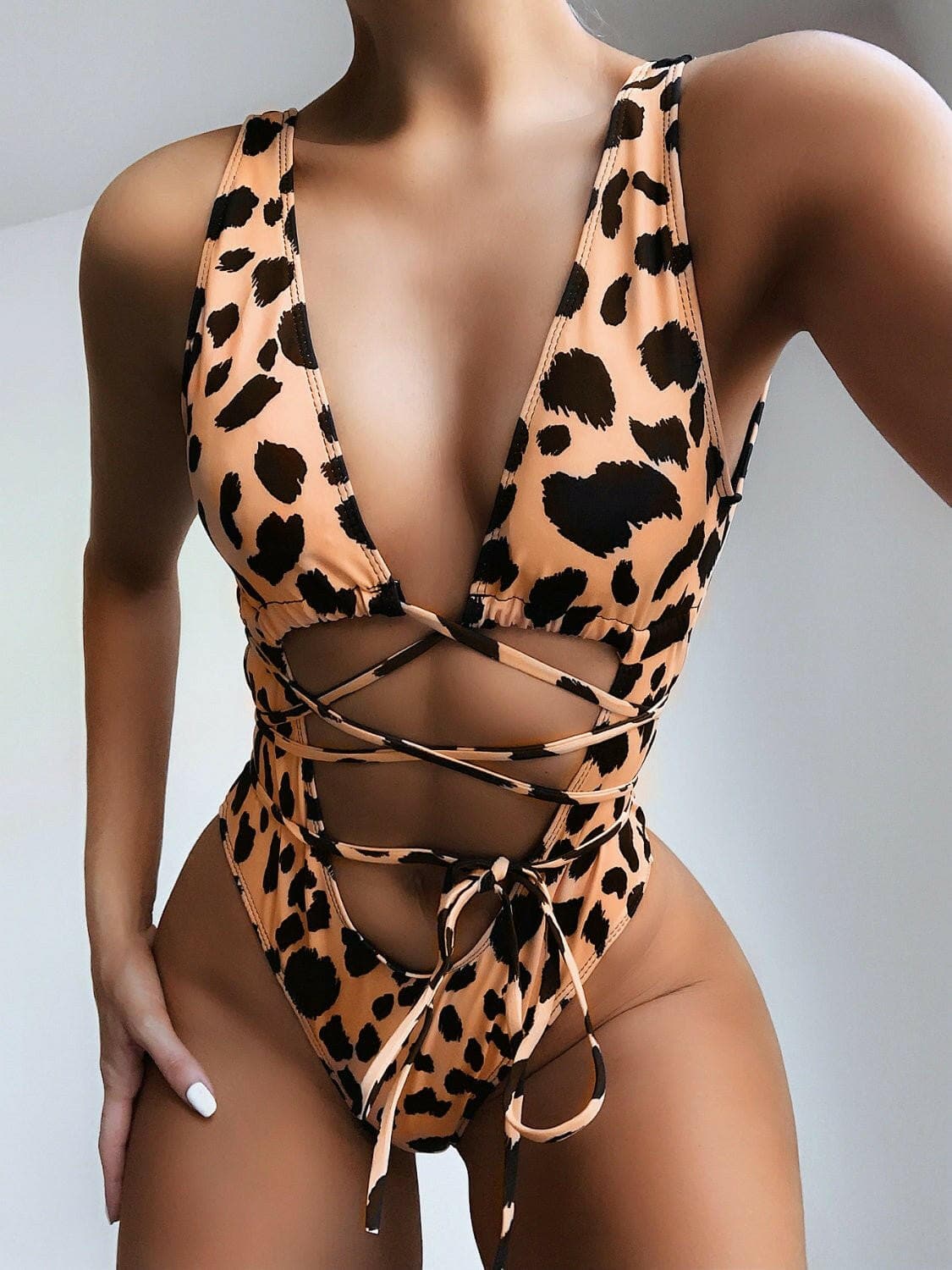 Lace-Up Backless Plunging One-Piece SwimsuitTurn Heads with Our Lace-Up Backless Plunging One-Piece Swimsuit!
 
 
Style: This swimsuit features a basic yet stunning design that is sure to make a statement.
 
CLove Salve Backless Plungingswimwear