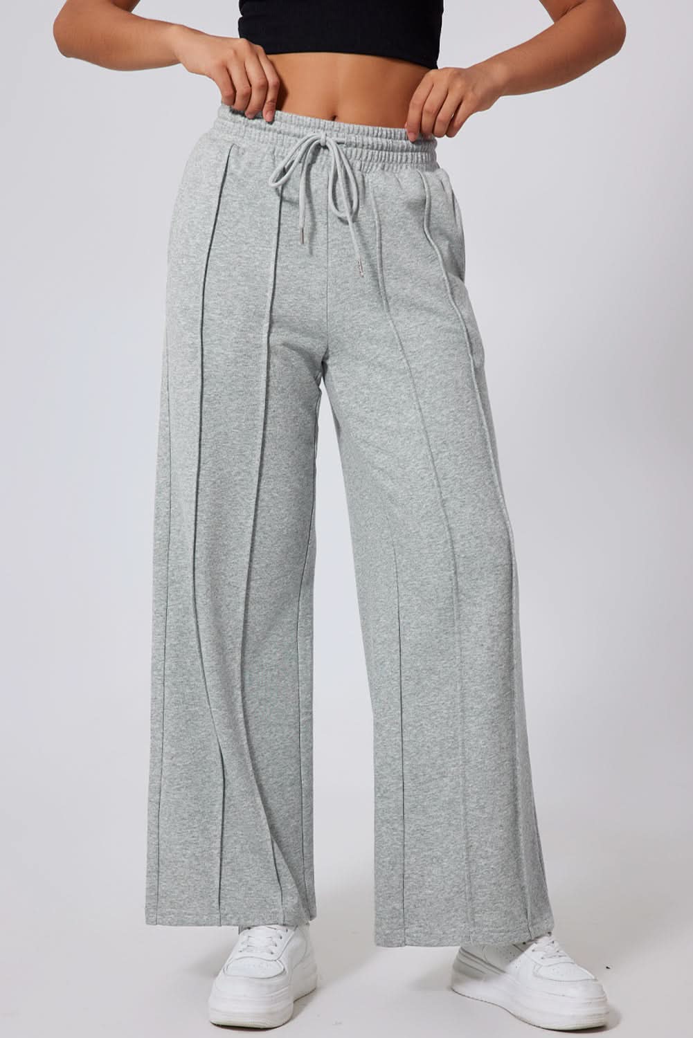 Gray seamed drawstring high waist wide leg sweatpants.