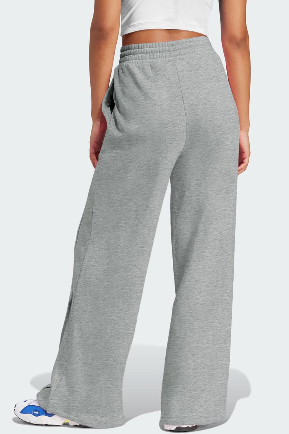 Gray wide leg sweatpants with high waist and drawstring.