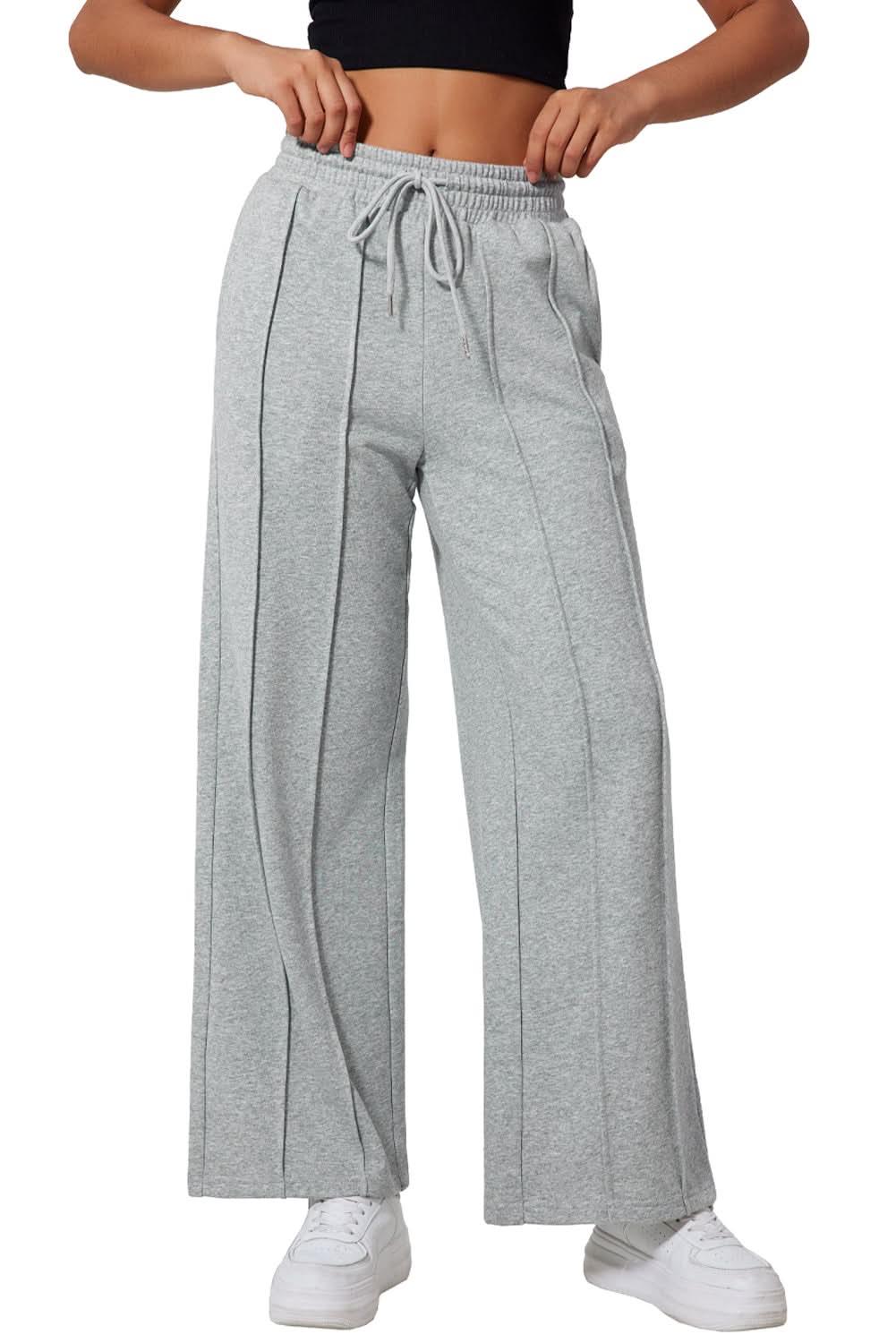 Gray wide leg sweatpants with seamed detailing and drawstring high waist.