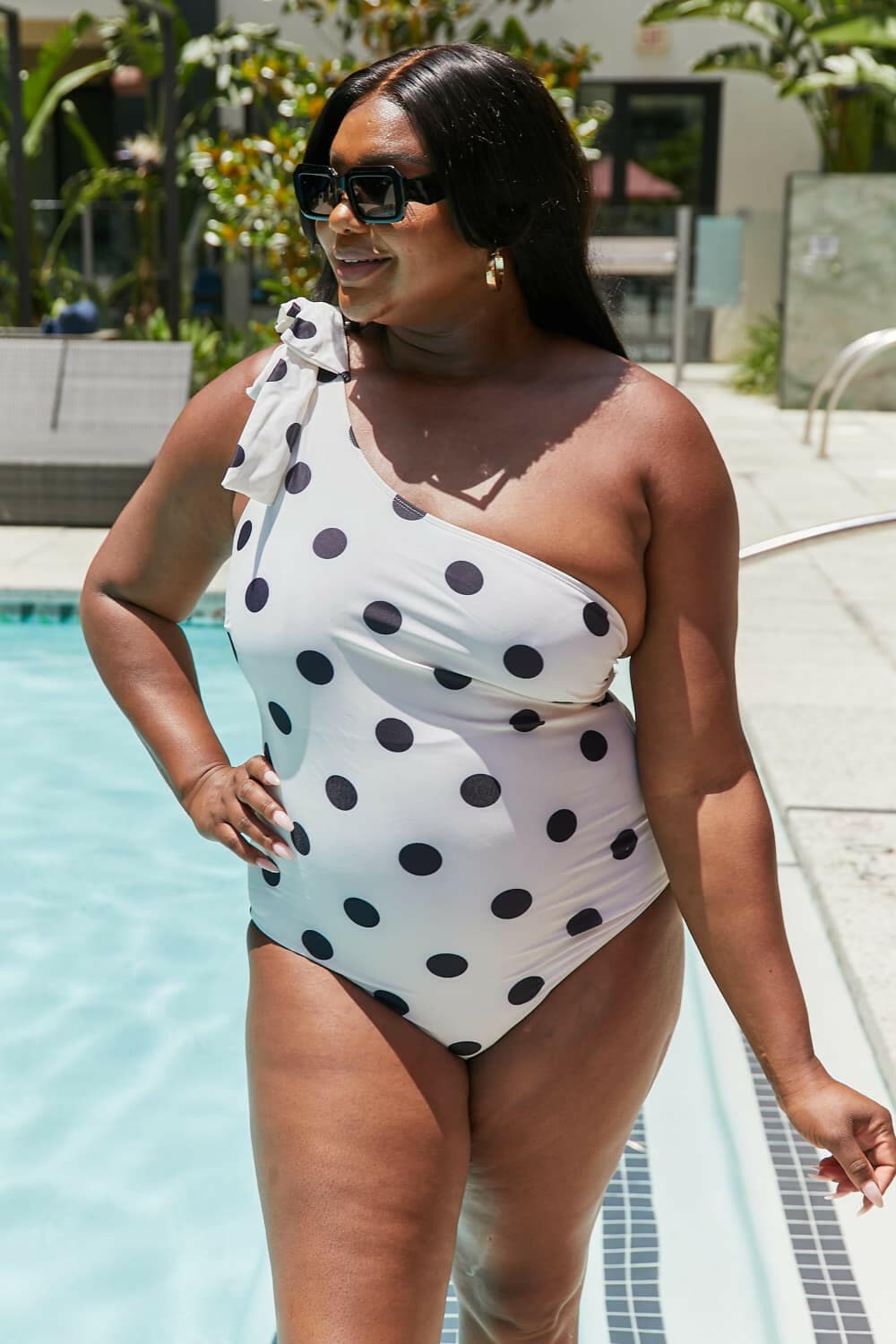 Marina West's Radiant One-Shoulder Polka Dot SwimsuitExperience Elegance with Marina West's Radiant One-Shoulder Polka Dot Swimsuit
 Make a splash this season with the Radiant One-Shoulder Polka Dot Swimsuit from MarinLove Salve -Shoulder Polka Dot Swimsuitswimwear