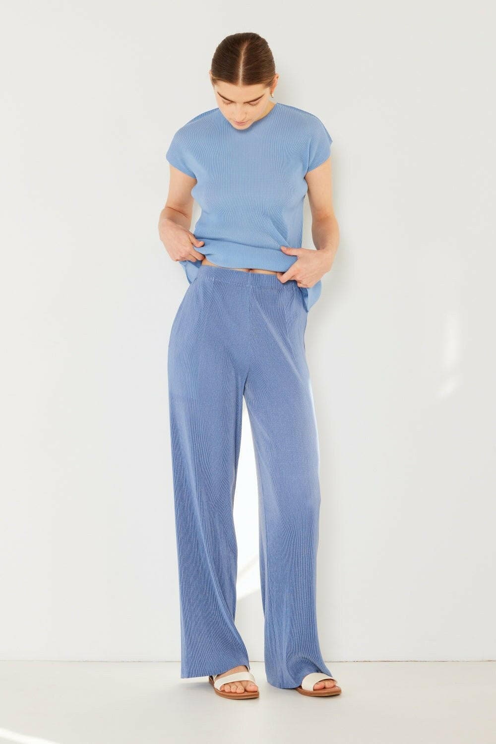 Elevate Your Style: Chic Ribbed Wide Leg Pants with Pleated Accents - Elevate Your Style with Chic Ribbed Wide Leg Pants
 Step into a world of sophistication with the Marina West Swim Ribbed Wide Leg Pants. These pants are not just a pLove Salve Chic Ribbed Wide Leg Pants