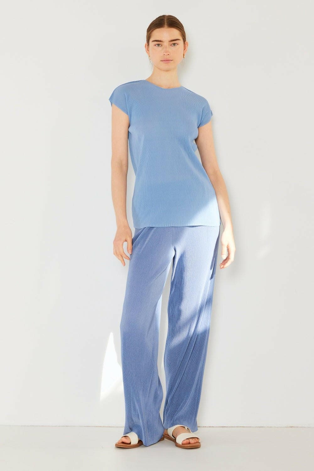 Elevate Your Style: Chic Ribbed Wide Leg Pants with Pleated Accents - Elevate Your Style with Chic Ribbed Wide Leg Pants
 Step into a world of sophistication with the Marina West Swim Ribbed Wide Leg Pants. These pants are not just a pLove Salve Chic Ribbed Wide Leg Pants