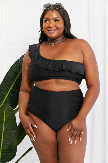 Seaside Serenade One-Shoulder Ruffle Bikini Set in Black by Marina WesExperience Elegance with the Seaside Serenade One-Shoulder Ruffle Bikini Set
 Step into a world of sophistication and style with the Seaside Serenade One-Shoulder RuLove Salve -Shoulder Ruffle Bikini Setswimwear