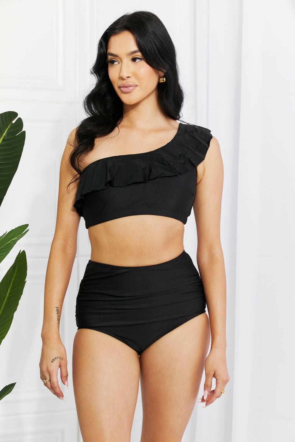 Seaside Serenade One-Shoulder Ruffle Bikini Set in Black by Marina WesExperience Elegance with the Seaside Serenade One-Shoulder Ruffle Bikini Set
 Step into a world of sophistication and style with the Seaside Serenade One-Shoulder RuLove Salve -Shoulder Ruffle Bikini Setswimwear