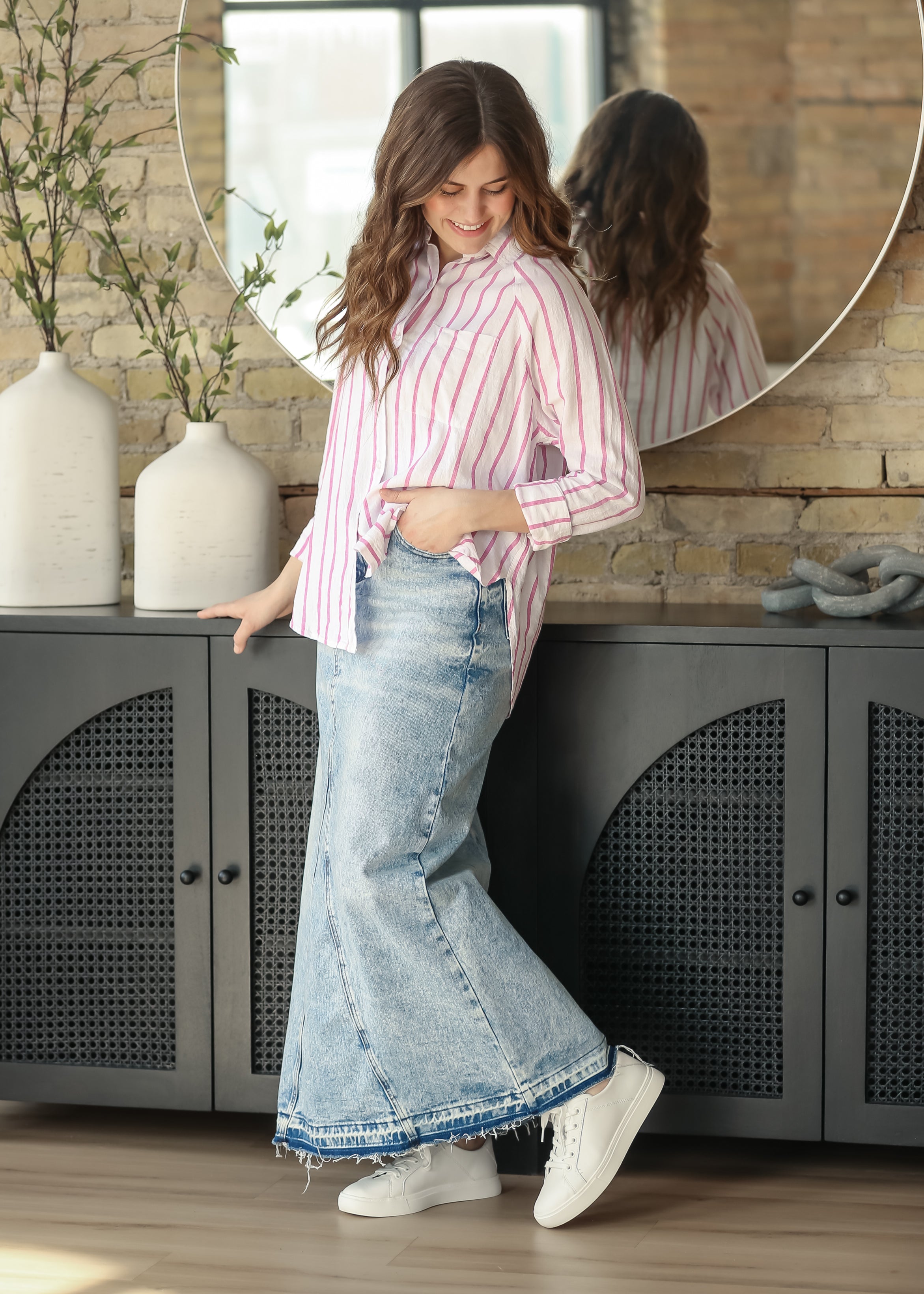 Full length, front view of the Inherit Co. Mina Denim Maxi Skirt, showcasing its A-line silhouette and high-waisted design.