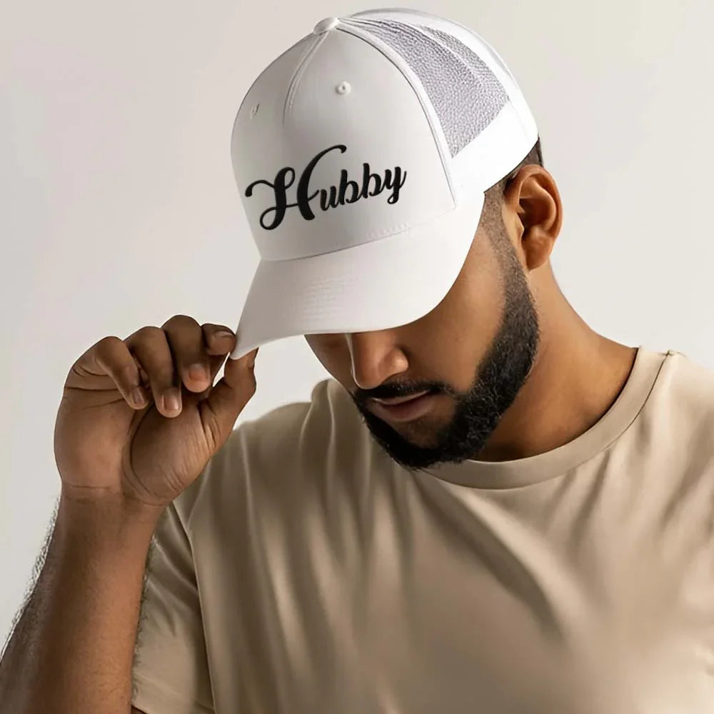 Side view of the Adorb.co Hubby Hat showing the structured front panel and breathable black mesh back for comfortable wear.