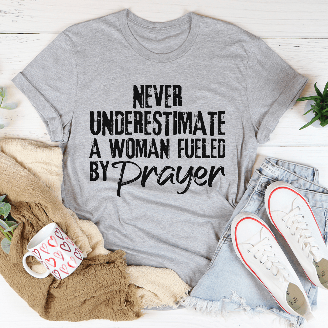 Never Underestimate A Woman Fueled By Prayer Tee - Love Salve 