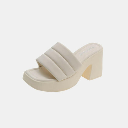 Elevated Block Heel Peep-Toe Sandals in cream color showcasing a chic, stylish design.