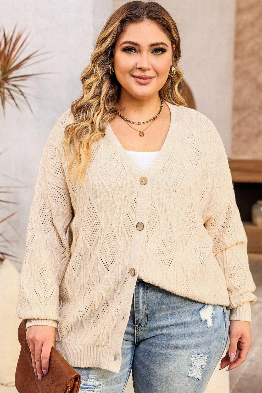 Cozy Plus Size Cable-Knit Cardigan SweaterStay Cozy in Style with Our Plus Size Cable-Knit Cardigan Sweater
 Wrap yourself in warmth and style with our Cozy Plus Size Cable-Knit Cardigan Sweater. Crafted froLove Salve Cozyplus