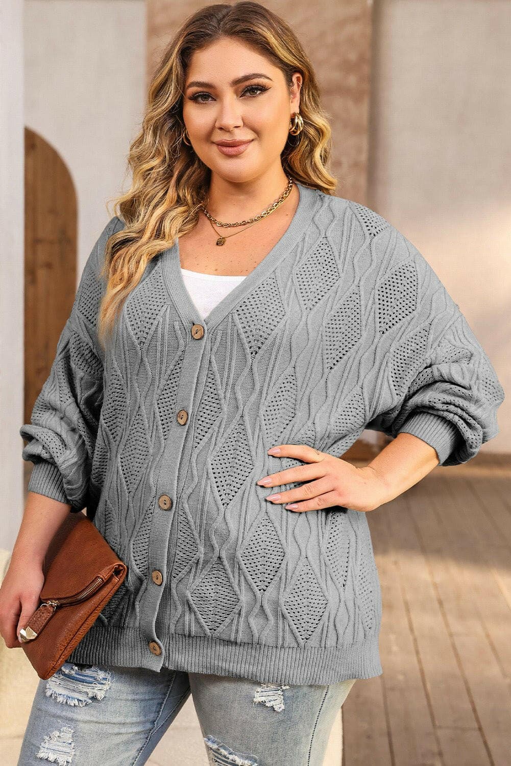 Cozy Plus Size Cable-Knit Cardigan SweaterStay Cozy in Style with Our Plus Size Cable-Knit Cardigan Sweater
 Wrap yourself in warmth and style with our Cozy Plus Size Cable-Knit Cardigan Sweater. Crafted froLove Salve Cozyplus