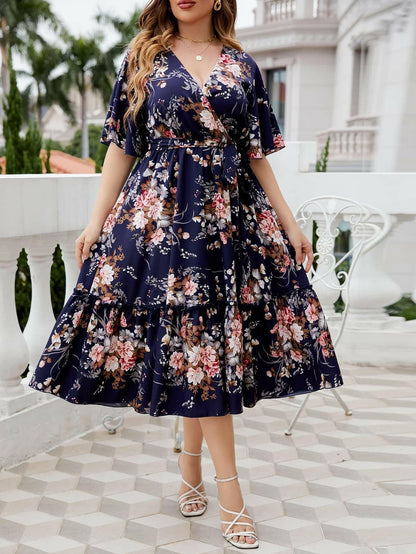 Floral Print Plus Size Midi Dress with Surplice NecklineUpgrade Your Wardrobe with a Stunning Floral Midi Dress
 
 Embrace modern style with a charming floral print
 Surplice neckline and frill details add a touch of elegLove Salve Size Midi Dressplus