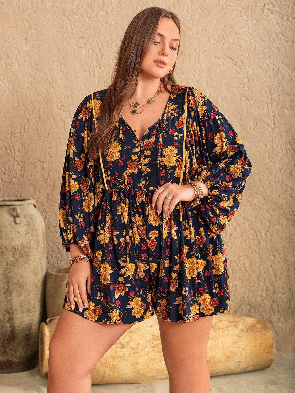 Floral Print Plus Size Tie Neck Balloon Sleeve JumpsuitUpgrade Your Style with our Floral Print Plus Size Jumpsuit!
 Step into the spotlight with our chic Floral Print Plus Size Tie Neck Balloon Sleeve Jumpsuit. Elevate Love Salve Size Tie Neck Balloon Sleeve Jumpsuitplus