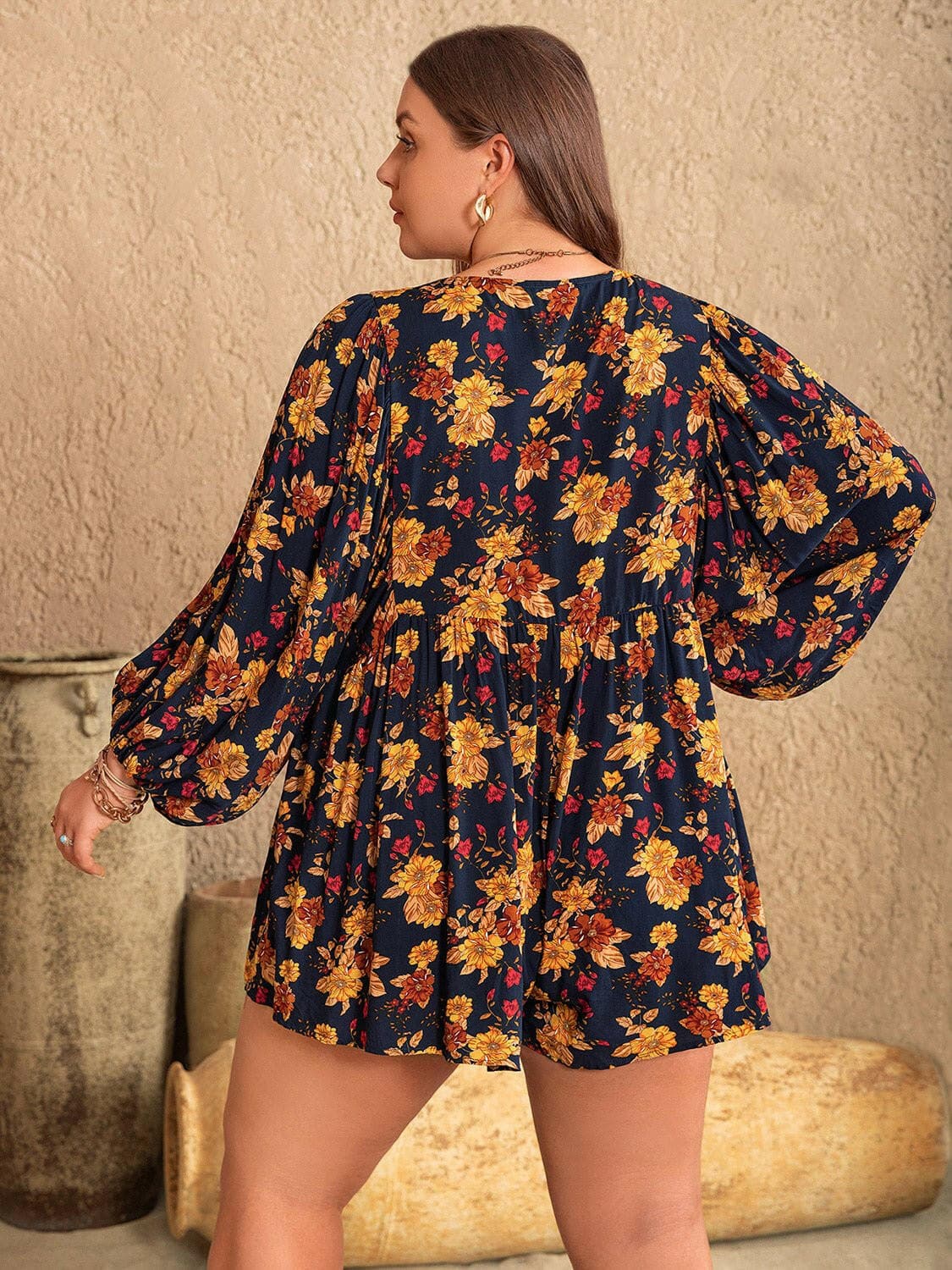 Floral Print Plus Size Tie Neck Balloon Sleeve JumpsuitUpgrade Your Style with our Floral Print Plus Size Jumpsuit!
 Step into the spotlight with our chic Floral Print Plus Size Tie Neck Balloon Sleeve Jumpsuit. Elevate Love Salve Size Tie Neck Balloon Sleeve Jumpsuitplus