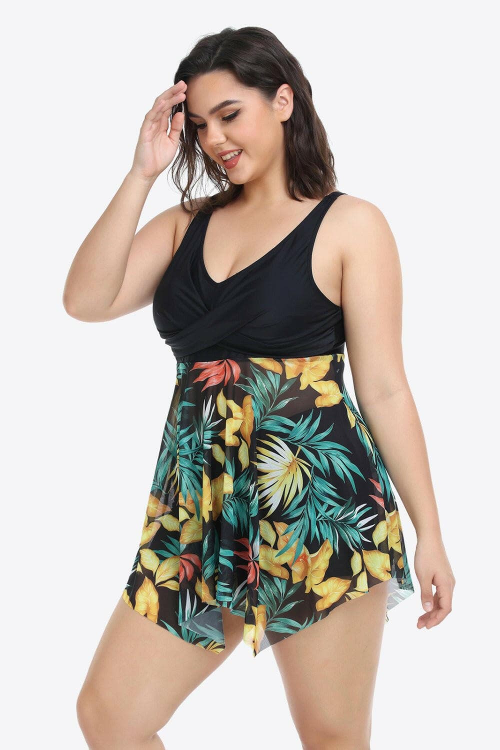 Floral Plus Size Two-Piece Swimsuit with Asymmetrical HemFloral Plus Size Two-Piece Swimsuit with Asymmetrical Hem
 Make a statement at the beach with our Floral Plus Size Two-Piece Swimsuit featuring an asymmetrical hem dLove Salve -Piece Swimsuitswimwear