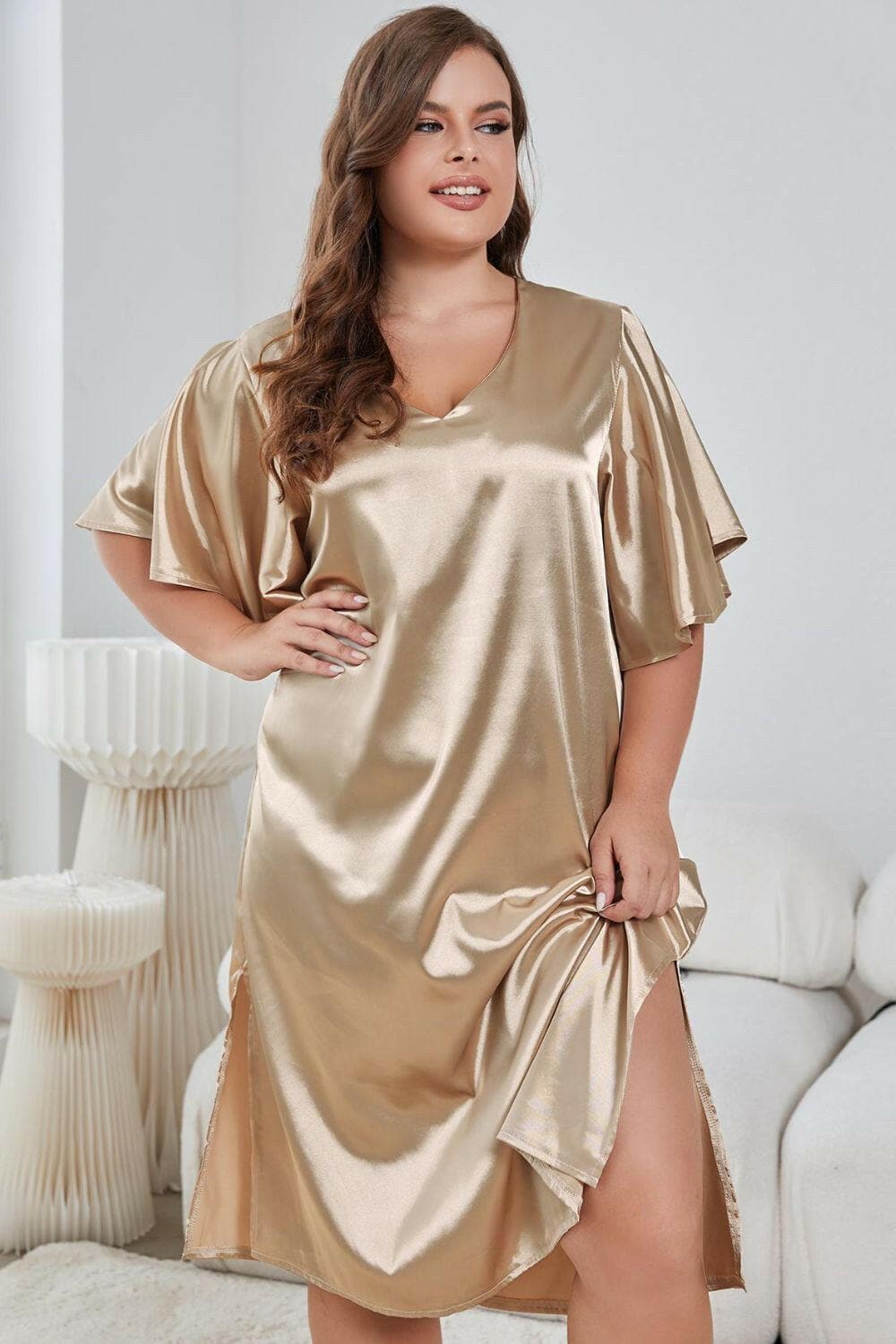 Elegant V-Neck Flutter Sleeve Plus Size Night DressUpgrade Your Nightwear with Our Elegant V-Neck Flutter Sleeve Plus Size Night Dress
 
 
Size: Embrace your curves in our stylish plus-size night dress.
 
Design: EnhLove Salve -Neck Flutter Sleeveswimwear