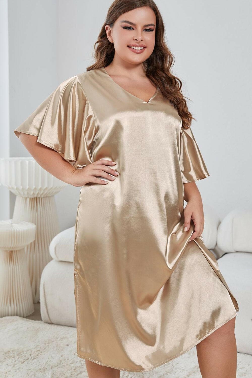 Elegant V-Neck Flutter Sleeve Plus Size Night DressUpgrade Your Nightwear with Our Elegant V-Neck Flutter Sleeve Plus Size Night Dress
 
 
Size: Embrace your curves in our stylish plus-size night dress.
 
Design: EnhLove Salve -Neck Flutter Sleeveswimwear