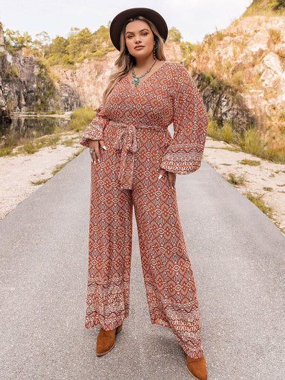 Vibrant Plus Size Printed V-Neck Balloon Sleeve Jumpsuit with Front TiUpgrade Your Style with our Vibrant Plus Size Jumpsuit
 
 
Stand Out: Embrace your vibrant side with this eye-catching printed jumpsuit.
 
Flattering Fit: Designed fLove Salve -Neck Balloon Sleeve Jumpsuitplus