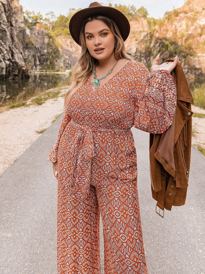 Vibrant Plus Size Printed V-Neck Balloon Sleeve Jumpsuit with Front TiUpgrade Your Style with our Vibrant Plus Size Jumpsuit
 
 
Stand Out: Embrace your vibrant side with this eye-catching printed jumpsuit.
 
Flattering Fit: Designed fLove Salve -Neck Balloon Sleeve Jumpsuitplus