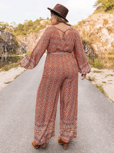 Vibrant Plus Size Printed V-Neck Balloon Sleeve Jumpsuit with Front TiUpgrade Your Style with our Vibrant Plus Size Jumpsuit
 
 
Stand Out: Embrace your vibrant side with this eye-catching printed jumpsuit.
 
Flattering Fit: Designed fLove Salve -Neck Balloon Sleeve Jumpsuitplus