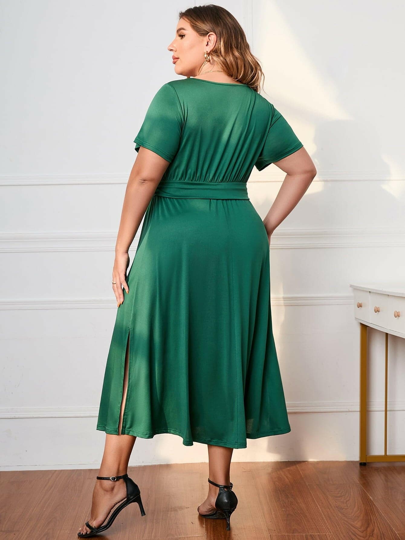 Chic Plus Size Surplice Midi Dress with Short SleevesChic Plus Size Surplice Midi Dress with Short Sleeves
 Elevate your style effortlessly with our Chic Plus Size Surplice Midi Dress, designed to enhance your look forLove Salve Size Surplice Midi Dressplus