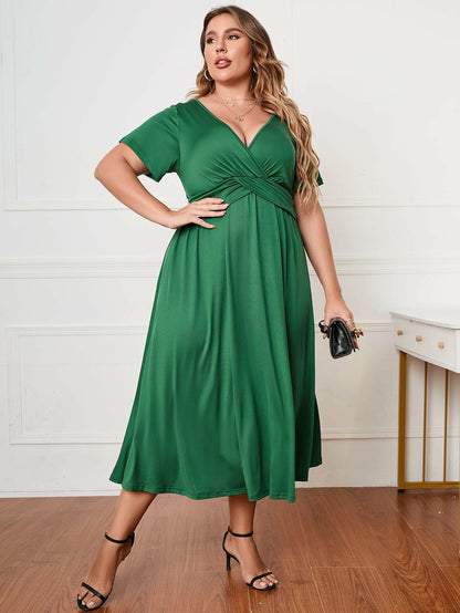 Chic Plus Size Surplice Midi Dress with Short SleevesChic Plus Size Surplice Midi Dress with Short Sleeves
 Elevate your style effortlessly with our Chic Plus Size Surplice Midi Dress, designed to enhance your look forLove Salve Size Surplice Midi Dressplus