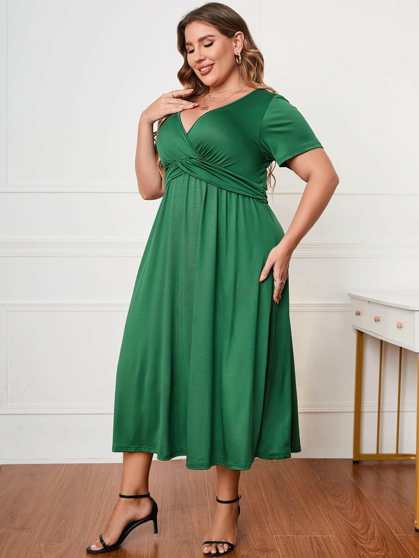 Chic Plus Size Surplice Midi Dress with Short SleevesChic Plus Size Surplice Midi Dress with Short Sleeves
 Elevate your style effortlessly with our Chic Plus Size Surplice Midi Dress, designed to enhance your look forLove Salve Size Surplice Midi Dressplus