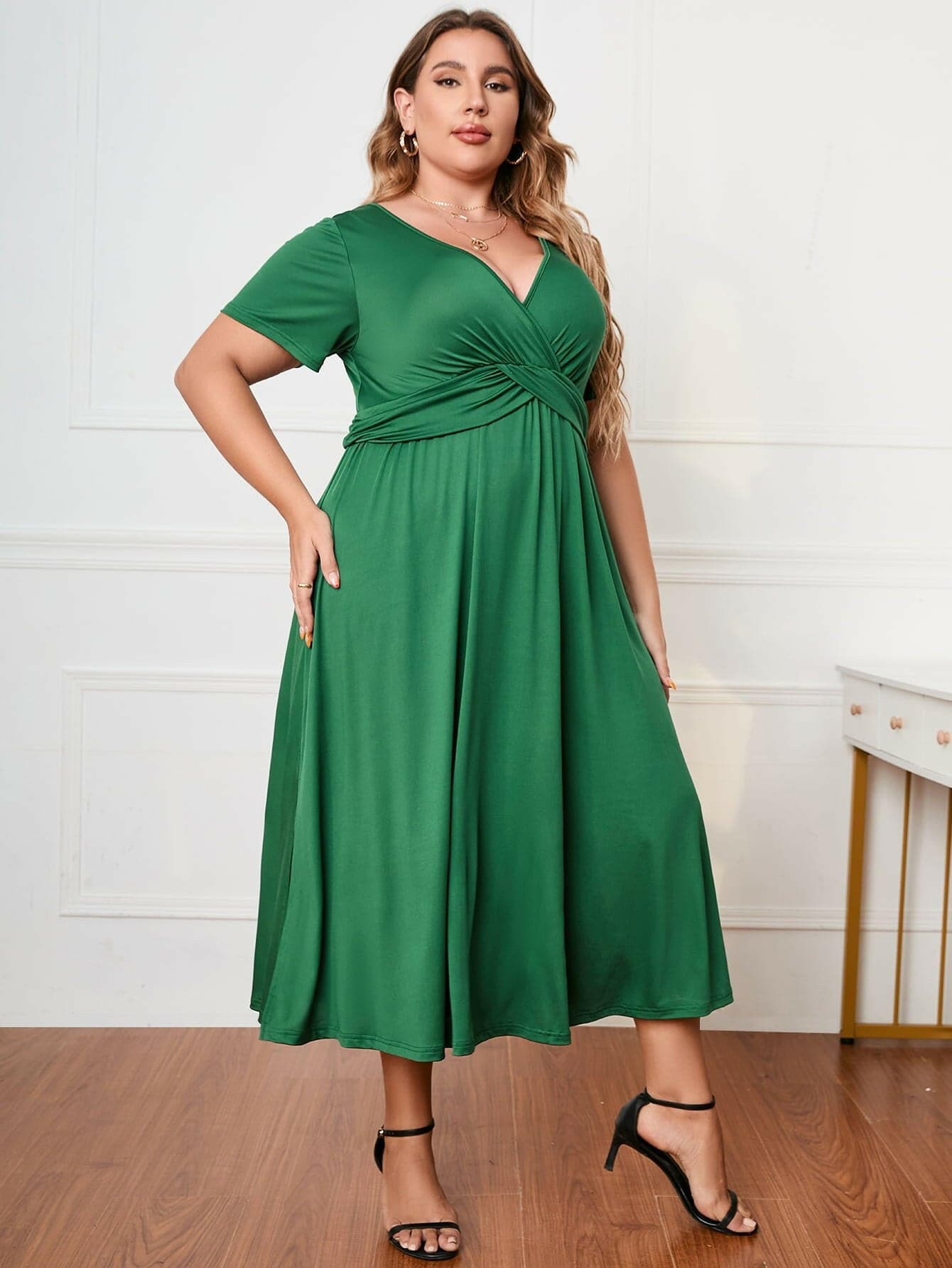 Chic Plus Size Surplice Midi Dress with Short SleevesChic Plus Size Surplice Midi Dress with Short Sleeves
 Elevate your style effortlessly with our Chic Plus Size Surplice Midi Dress, designed to enhance your look forLove Salve Size Surplice Midi Dressplus