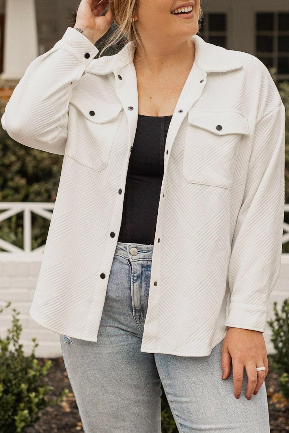 Chic oversized drop sleeve jacket with snap front closure, relaxed fit, and soft polyester blend fabric.