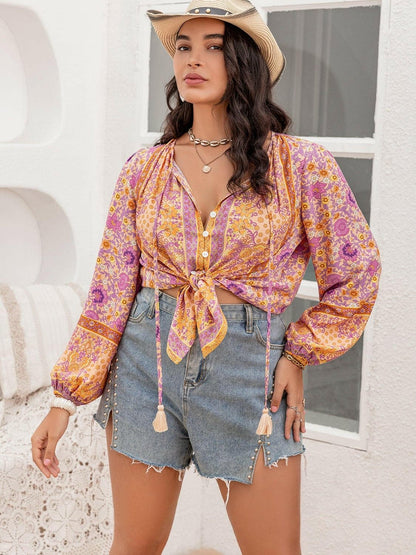 Tassel Printed Plus Size Tie Neck Blouse with Decorative ButtonTassel Printed Plus Size Tie Neck Blouse with Decorative Button
 Upgrade your wardrobe with a touch of sophistication and elegance by adding our Tassel Printed Plus Love Salve Size Tie Neck Blouseplus