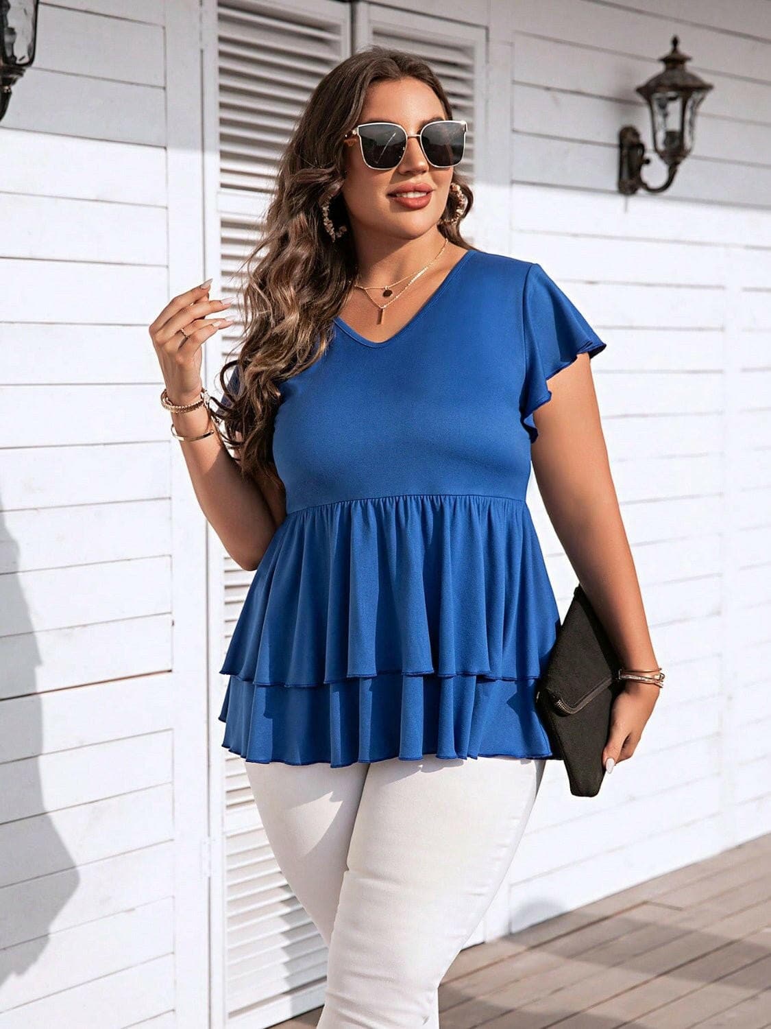 Vibrant V-Neck Flutter Sleeve Plus Size TopExperience Effortless Elegance with our Vibrant V-Neck Flutter Sleeve Plus Size Top!
 
 
Flattering Design: Embrace your curves in style with the V-neckline and flutLove Salve -Neck Flutter Sleeveplus