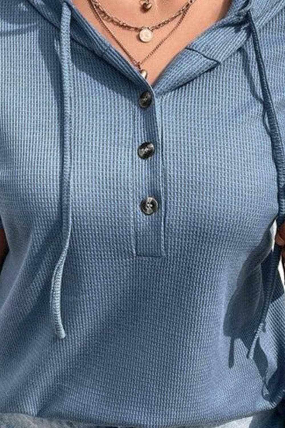 Waffle Texture Plus Size Half Button Hooded TopWaffle Texture Plus Size Half Button Hooded Top
 Upgrade your wardrobe with a touch of sophistication and comfort with our Waffle Texture Plus Size Half Button HoodeLove Salve Size Half Button Hooded Topplus