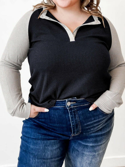 Plus size waffle-knit half snap long sleeve top with stylish and comfortable design.