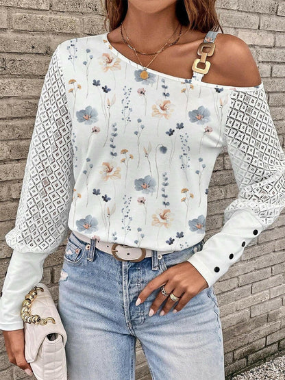 Chic asymmetrical sleeve t-shirt with unique neck detail and floral pattern.